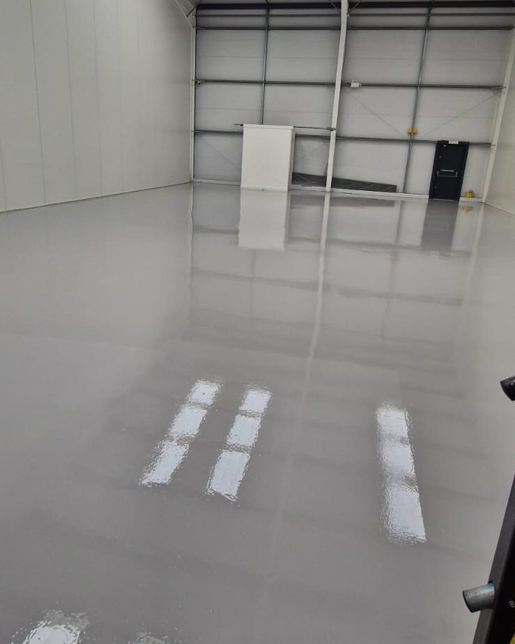 Electronics manufacturer Beckenham resin floor coating replacing failed solvent-based system