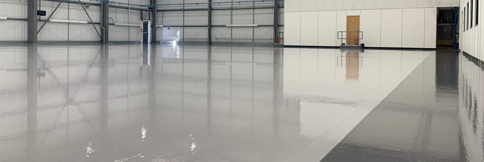EV technology facility Feltham industrial resin floor
