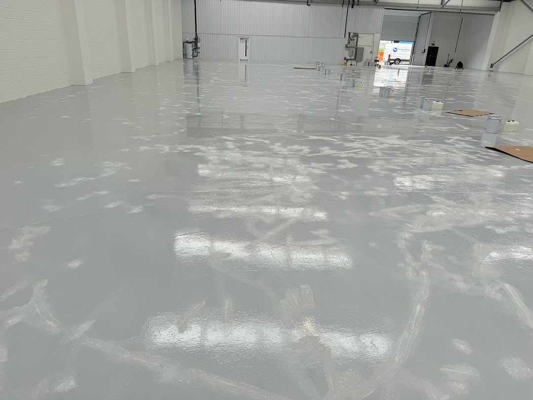Industrial epoxy floor during building envelope works